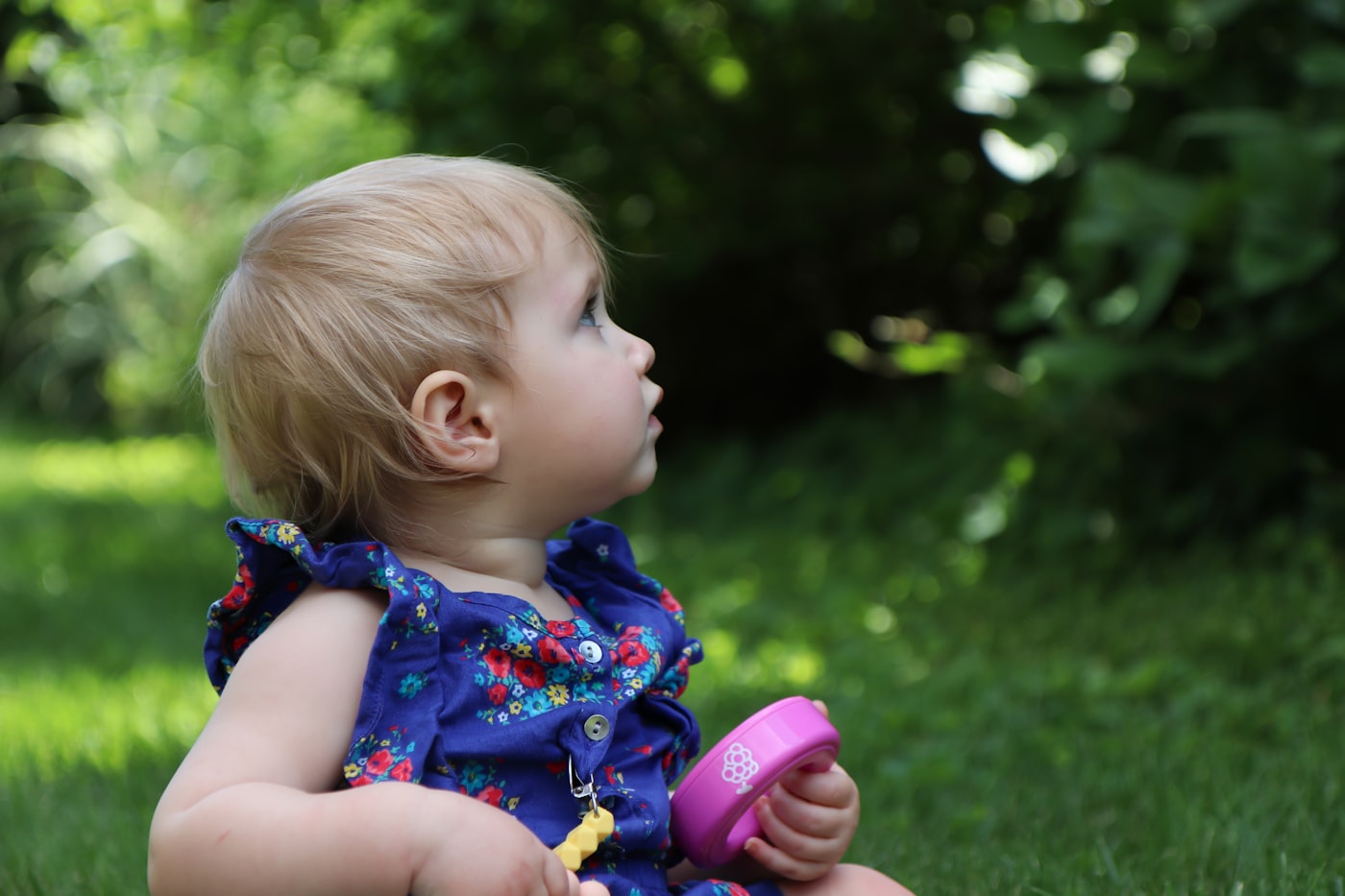 A child playing on the green